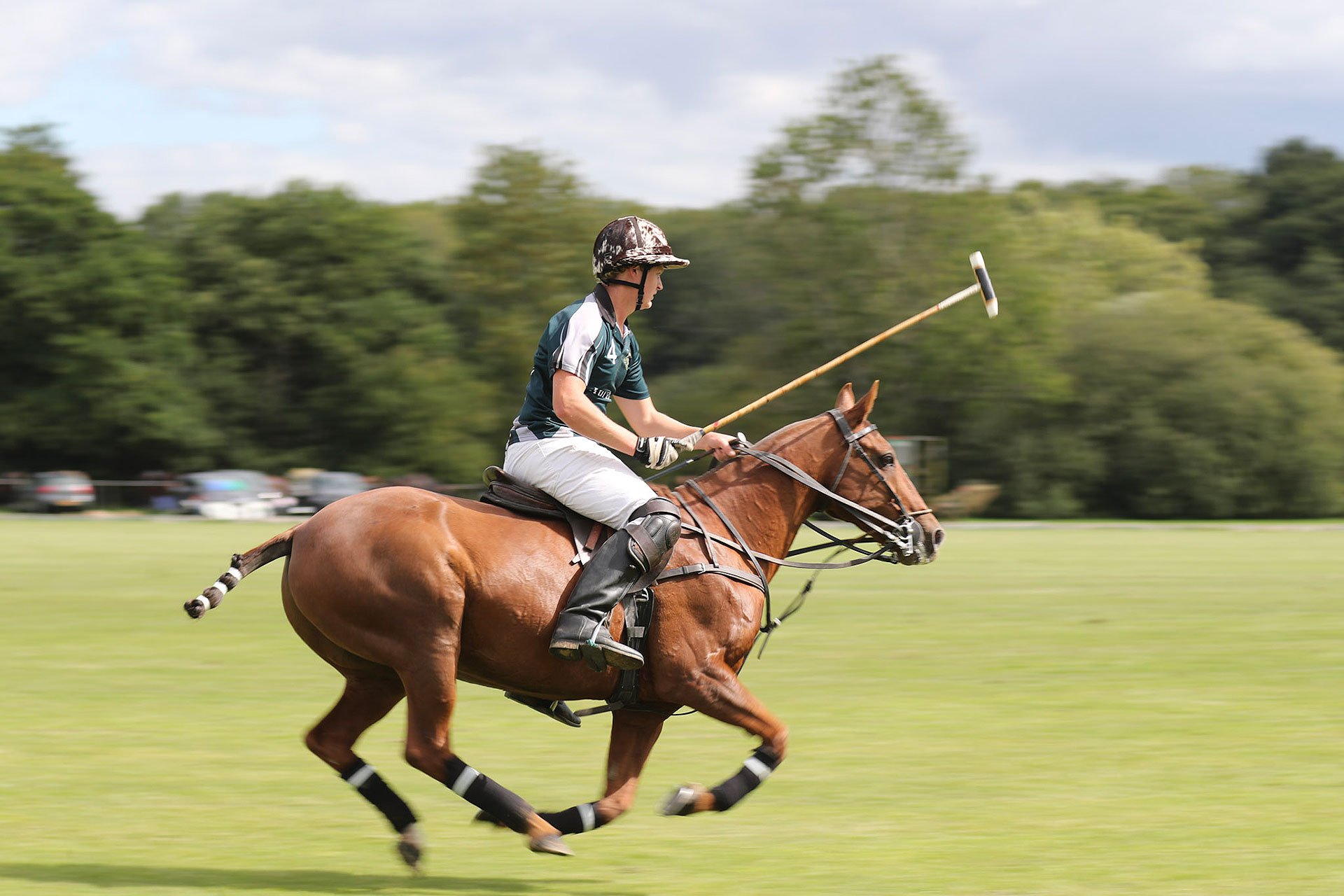 Polo in action at Hurtwood Park Polo Club